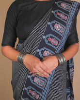 GAURI Black Muslin Line saree set